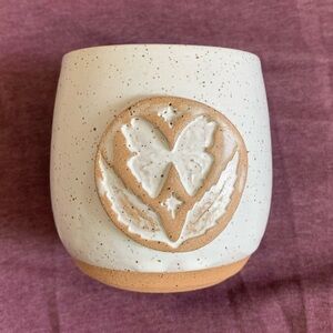 Sister Nettle logo cup